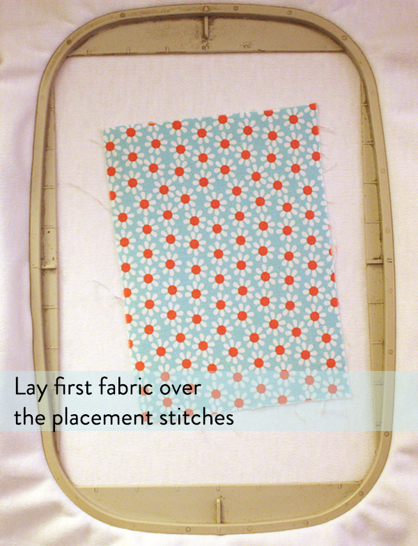 lay first fabric over the placement lines