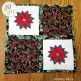Poinsettia Mini Quilt by Oma's Place | Machine Embroidery Designs by JuJu