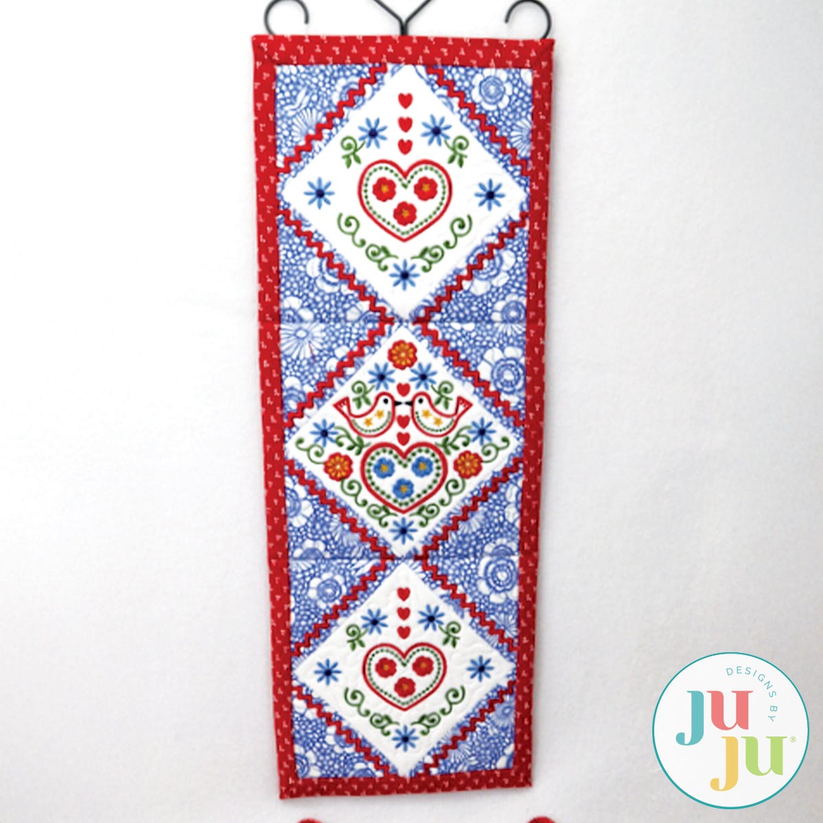 Folkloric Wall Hanging by Oma's Place | Machine Embroidery Designs by JuJu