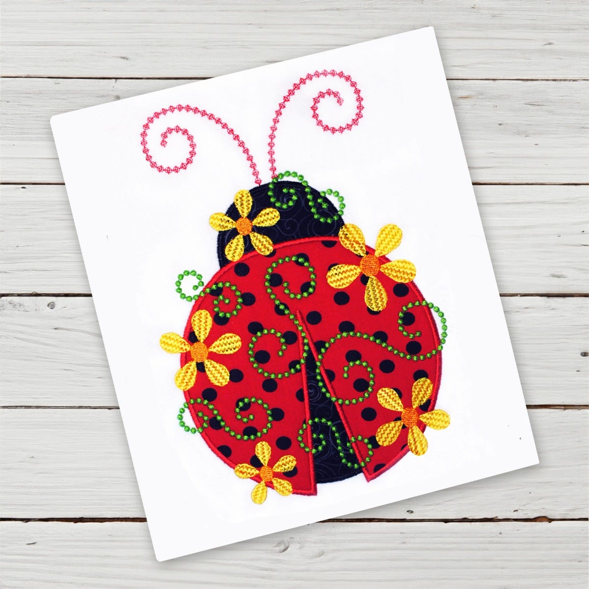 Daisy Swirl Ladybug | Machine Embroidery Designs by JuJu